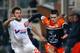 Montpellier's French midfielder Remy Cabella, right, challenges for the ball with Marseille's French forward Andre-Pierre Gignac, during their League One soccer match, at the Velodrome Stadium, in Marseille, southern France, Friday, Nov. 29, 2013. (AP Photo/Claude Paris)
