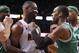 Oct 30, 2012; Miami, FL, USA; Boston Celtics point guard Rajon Rondo (right) gestures at Miami Heat shooting guard Dwyane Wade (3) during the second half at American Airlines Arena. The Heat won 120-107. Mandatory Credit: Steve Mitchell-USA TODAY Sports