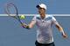 Andy Murray of Britain makes a forehand return to Stephane Robert of France during their fourth round match at the Australian Open tennis championship in Melbourne, Australia, Monday, Jan. 20, 2014.(AP Photo/Andrew Brownbill)