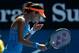 Ana Ivanovic of Serbia celebrates her win over Serena Williams of the U.S. during their fourth round match at the Australian Open tennis championship in Melbourne, Australia, Sunday, Jan. 19, 2014.(AP Photo/Aaron Favila)