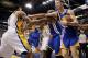 Feb 26 2013; Indianapolis, IN, USA; Indiana Pacers guard George Hill (3) gets punched by Golden State Warriors guard Klay Thompson (11) as a fight breaks out during the game at Bankers Life Fieldhouse. Mandatory Credit: Brian Spurlock-USA TODAY Sports