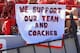 Fans sit behind a poster in support of the Nebraska team and coaches in the first half of an NCAA college football game against South Dakota State in Lincoln, Neb., Saturday, Sept. 21, 2013. (AP Photo/Nati Harnik)
