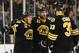 BOSTON, MA - JANUARY 20: Brad Marchand #63, Johnny Boychuk #55 and Zdeno Chara #33 of the Boston Bruins celebrate a goal against the Los Angeles Kings at the TD Garden on January 20, 2014 in Boston, Massachusetts. (Photo by Brian Babineau/NHLI via Getty Images)