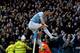 Manchester City's Jesus Navas celebrates after scoring against Cardiff City during their English Premier League soccer match at the Etihad Stadium, Manchester, England, Saturday Jan 18, 2014. (AP Photo/Jon Super)