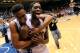 DURHAM, NC - JANUARY 13: Jabari Parker #1 and Amile Jefferson #21 of the Duke Blue Devils celebrate as they leave the floor following a last-second win over the Virginia Cavaliers at Cameron Indoor Stadium on January 13, 2014 in Durham, North Carolina. Duke won 69-65. (Photo by Grant Halverson/Getty Images)