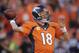 Denver Broncos quarterback Peyton Manning (18) passes the ball during the second half of the AFC Championship NFL playoff football game against the New England Patriots in Denver, Sunday, Jan. 19, 2014. (AP Photo/Joe Mahoney)