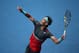 MELBOURNE, AUSTRALIA - JANUARY 20: Rafael Nadal of Spain serves in his fourth round match against Kei Nishikori of Japan during day eight of the 2014 Australian Open at Melbourne Park on January 20, 2014 in Melbourne, Australia. (Photo by Clive Brunskill/Getty Images)