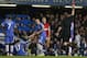 Manchester United's Nemanja Vidic, centre, is shown a red card by referee Phil Dowd during the English Premier League soccer match against Chelsea at Stamford Bridge, London, Sunday, Jan. 19, 2014. (AP Photo/Sang Tan)