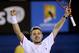 Stanislas Wawrinka of Switzerland celebrates after defeating Novak Djokovic of Serbia in their quarterfinal at the Australian Open tennis championship in Melbourne, Australia, Tuesday, Jan. 21, 2014.(AP Photo/Rick Rycroft)
