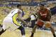 Miami Heat forward LeBron James (6) drives the ball against Indiana Pacers forward Paul George (24) during the first half of Game 6 of the NBA Eastern Conference basketball finals in Indianapolis, Saturday, June 1, 2013. (AP Photo/Michael Conroy)