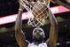 Miami Heat small forward LeBron James (6) scores against the Boston Celtics during the second quarter of an NBA basketball game in Miami, Tuesday, Jan. 21, 2014. (AP PhotoAlan Diaz)