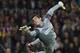 Atletico Madrid's goalkeeper Thibaut Courtois of Belgium fails to stop a shot from FC Barcelona's Adriano during a Spanish La Liga soccer match at the Camp Nou stadium in Barcelona, Spain, Sunday, Dec. 16, 2012, (AP Photo/Bernat Armangue)