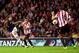 Manchester United's Adnan Januzaj, left, scores his goal past Sunderland's captain John O'Shea, right, during their English Premier League soccer match at the Stadium of Light, Sunderland, England, Saturday, Oct. 5, 2013. (AP Photo/Scott Heppell)