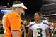 Denver Broncos quarterback Peyton Manning (18) shakes hands with Seattle Seahawks quarterback Russell Wilson (3) following an NFL football preseason game, Saturday, Aug. 18, 2012, in Denver. Seattle beat Denver 30-10. (AP Photo/Jack Dempsey)