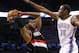 Oklahoma City Thunder forward Kevin Durant (35) defends Portland Trail Blazers forward LaMarcus Aldridge (12) in the first quarter of an NBA basketball game in Oklahoma City, Tuesday, Jan. 21, 2014. (AP Photo/Sue Ogrocki)
