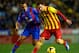 VALENCIA, SPAIN - JANUARY 19: Nabil El Zhar (L) of Levante competes for the ball with Lionel Messi of Barcelona during the la Liga match between Levante UD and FC Barcelona at Ciutat de Valencia on January 19, 2014 in Valencia, Spain. (Photo by Manuel Queimadelos Alonso/Getty Images)