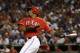 Texas Rangers right fielder Nelson Cruz (17) follows through on a swing against the Tampa Bay Rays during the fifth inning of an American League wild-card tiebreaker baseball game Monday, Sept. 30, 2013, in Arlington, Texas. (AP Photo/Tony Gutierrez)