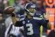 Seattle Seahawks' Russell Wilson throws during the first half of the NFL football NFC Championship game against the San Francisco 49ers, Sunday, Jan. 19, 2014, in Seattle. (AP Photo/Ted S. Warren)
