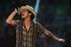 FILE - In this Sept. 21, 2013 file photo, Bruno Mars performs at IHeartRadio Music Festival in Las Vegas. The 28-year-old, Mars latest album, “Unorthodox Jukebox,” is nominated for four honors at Sunday’s Grammy Awards in Los Angeles. (Photo by Al Powers/Powers Imagery/Invision /AP, File)