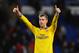 CARDIFF, WALES - NOVEMBER 30: Per Mertesacker of Arsenal celebrates victory after the Barclays Premier League match between Cardiff City and Arsenal at Cardiff City Stadium on November 30, 2013 in Cardiff, Wales. (Photo by Mike Hewitt/Getty Images)