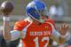 South Squad quarterback David Fales of San Jose State (12) throws a pass during Senior Bowl practice at Fairhope Municipal Stadium, Monday, Jan. 20, 2014 in Fairhope, Ala. (AP Photo/G.M. Andrews)