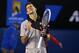 Jan 21, 2014; Melbourne, AUSTRALIA; Novak Djokovic (SRB) reacts during his match against Stanislas Wawrinka (SUI) on day nine of the 2014 Australian Open at Melbourne Park. Mandatory Credit: Nicolas Luttiau/Presse Sports via USA TODAY Sports