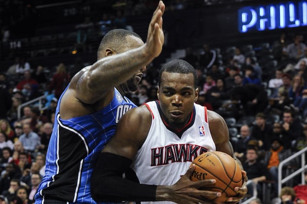 Hawks Hang on to Beat Magic 112-109