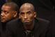 PHOENIX, AZ - JANUARY 15: Kobe Bryant #24 of the Los Angeles Lakers watches from the bench during the NBA game against the Phoenix Suns at US Airways Center on January 15, 2014 in Phoenix, Arizona. NOTE TO USER: User expressly acknowledges and agrees that, by downloading and or using this photograph, User is consenting to the terms and conditions of the Getty Images License Agreement. (Photo by Christian Petersen/Getty Images)