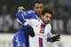 Schalke's Joel Matip, left, and Basel's Mohamed Salah challenge for the ball during the Champions League group E soccer match between FC Schalke 04 and FC Basel in Gelsenkirchen, Germany, Wednesday, Dec.11,2013. (AP Photo/Frank Augstein)