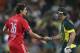 England captain Alastair Cook, left, shakes hands with Australia Shaun Marsh After their one-day international cricket match at the Sydney Cricket Ground in Sydney, Australia, Sunday, Jan. 19, 2014. Australia won the match by seven wickets. (AP Photo/Rob Griffith)
