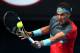 MELBOURNE, AUSTRALIA - JANUARY 20: Rafael Nadal of Spain plays a backhand in his fourth round match against Kei Nishikori of Japan during day eight of the 2014 Australian Open at Melbourne Park on January 20, 2014 in Melbourne, Australia. (Photo by Ryan Pierse/Getty Images)