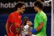 MELBOURNE, AUSTRALIA - JANUARY 26: Roger Federer of Switzerland and Rafael Nadal of Spain embrace at the net after their semifinal match during day eleven of the 2012 Australian Open at Melbourne Park on January 26, 2012 in Melbourne, Australia. (Photo by Clive Brunskill/Getty Images)