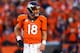 DENVER, CO - JANUARY 19: Peyton Manning #18 of the Denver Broncos in action against the New England Patriots during the AFC Championship game at Sports Authority Field at Mile High on January 19, 2014 in Denver, Colorado. (Photo by Justin Edmonds/Getty Images)