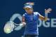 TORONTO, ON - AUGUST 09: Na Li of China hits a return during her 7-6 (1), 6-2 win over Dominika Cibulkova of Solvakia at the Rogers Cup Toronto on day 5 at Rexall Centre at York University on August 9, 2013 in Toronto, Canada. (Photo by Andy Lyons/Getty Images)