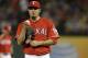 Texas Rangers starting pitcher Matt Garza (22) looks down as he works against the Minnesota Twins in the fourth inning of a baseball game, Saturday, Aug. 31, 2013, in Arlington, Texas. (AP Photo/Tony Gutierrez)