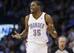 Oklahoma City Thunder forward Kevin Durant (35) gestures and smiles after hitting a basket in the second quarter of an NBA basketball game against the Portland Trail Blazers in Oklahoma City, Tuesday, Jan. 21, 2014. (AP Photo/Sue Ogrocki)