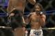 Benson Henderson, right, fights Gilbert Melendez in a UFC lightweight championship mixed martial arts fight in San Jose, Calif., Saturday, April 20, 2013. Henderson won by split decision to retain the championship. (AP Photo/Jeff Chiu)