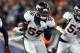 Nov 24, 2013; Foxborough, MA, USA; Denver Broncos outside linebacker Danny Trevathan (59) returns a recovered fumble during the first quarter against the New England Patriots at Gillette Stadium. Mandatory Credit: Stew Milne-USA TODAY Sports
