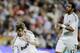 Real Madrid's Sergio Ramos, left, reacts next to Marcelo of Brazil during a Spanish La Liga soccer match against Getafe at the Santiago Bernabeu stadium in Madrid, Saturday Oct. 31, 2009. (AP Photo/Paul White)