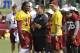 FILE - In this July 25, 2013 file photo, Washington Redskins quarterback coach, Matt LaFleur, center, talks with quarterbacks Robert Griffin III, left, and Kirk Cousins, right, on the field as they begin their training camp at the NFL football teams new practice facility in Richmond, Va. For once, Griffin looks like the healthier of the two young Redskins quarterbacks. (AP Photo/Steve Helber, File)