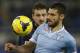 Lazio's Andrea Candreva and Inter of Milan's Zdravko Kuzmanovic fight for the ball during an Italian Serie A soccer match in Rome's Olympic stadium, Monday, Jan. 6, 2014. (AP Photo/Gregorio Borgia)