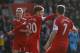 Southampton's Adam Lallana, center, celebrates his goal against Tottenham Hotspur with teammates during their English Premier League soccer match at St Mary's stadium, Southampton, England, Sunday, Dec. 22, 2013. (AP Photo/Sang Tan)