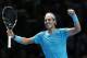 Rafael Nadal of Spain celebrates after winning the ATP World Tour Finals singles tennis match against Stanislas Wawrinka of Switzerland at the O2 Arena in London Wednesday, Nov. 6, 2013. (AP Photo/Sang Tan)