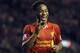 Liverpool's Raheem Sterling celebrates after scoring the fifth goal of the game during their English Premier League soccer match against Norwich City at Anfield in Liverpool, England, Wednesday Dec. 4, 2013. (AP Photo/Clint Hughes)