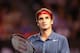 MELBOURNE, AUSTRALIA - JANUARY 24: Roger Federer of Switzerland looks on in his semifinal match against Rafael Nadal of Spain during day 12 of the 2014 Australian Open at Melbourne Park on January 24, 2014 in Melbourne, Australia. (Photo by Matt King/Getty Images)