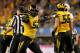 ARLINGTON, TX - JANUARY 03: Michael Sam #52 of the Missouri Tigers reacts after Ben Grogan #19 of the Oklahoma State Cowboys misses a 34-yard field goal in the second quarter during the AT&T Cotton Bowl on January 3, 2014 in Arlington, Texas. (Photo by Ronald Martinez/Getty Images)