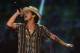 FILE - In this Sept. 21, 2013 file photo, Bruno Mars performs at IHeartRadio Music Festival in Las Vegas. The 28-year-old, Mars latest album, “Unorthodox Jukebox,” is nominated for four honors at Sunday’s Grammy Awards in Los Angeles. (Photo by Al Powers/Powers Imagery/Invision /AP, File)