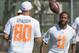 Arizona Cardinals wide receiver Larry Fitzgerald (11), of Team Rice, flips the football to New Orleans Saints tight end Jimmy Graham (80), also of Team Rice, during NFL football Pro Bowl practice Friday, Jan. 24, 2014, in Kapolei, Hawaii. (AP Photo/Eugene Tanner)