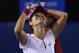 Li Na of China celebrates after defeating Dominika Cibulkova of Slovakia in their women's singles final at the Australian Open tennis championship in Melbourne, Australia, Saturday, Jan. 25, 2014.(AP Photo/Aaron Favila)