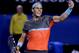Rafael Nadal of Spain celebrates after defeating Roger Federer of Switzerland during their semifinal at the Australian Open tennis championship in Melbourne, Australia, Friday, Jan. 24, 2014. (AP Photo/Aaron Favila)